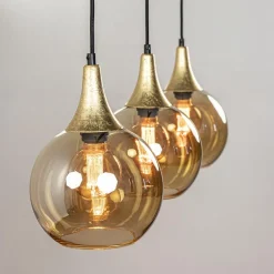 Chique 3-lichts hanglamp zwart/goud met amber glas