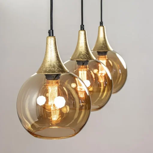 Chique 3-lichts hanglamp zwart/goud met amber glas