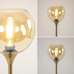 Gouden tafellamp met amber glazen bol 20 cm
