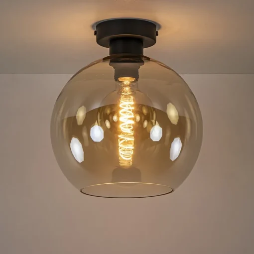Mat zwarte plafondlamp met amber glazen bol