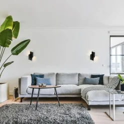 Mat zwarte wandlamp krul G9