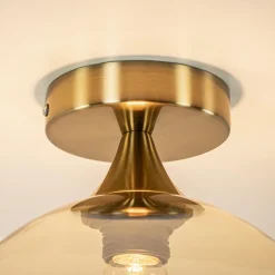 Ronde plafondlamp goud met amber glas